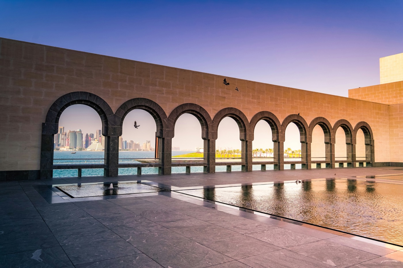 Museum of Islamic Art, Doha, arched gallery with skyline